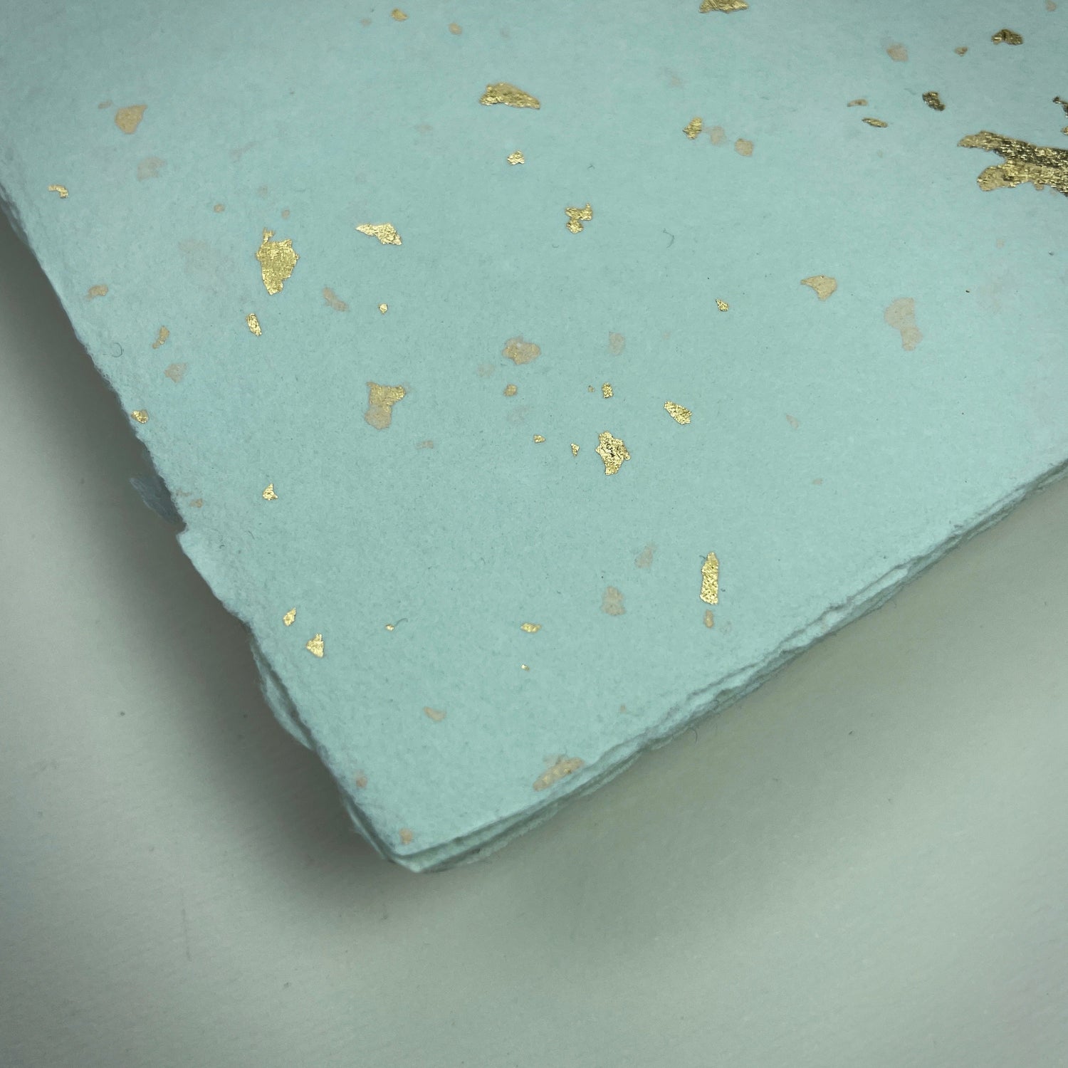 Büttenpapier mint / Goldflocken
